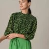 The Floral Puff Sleeve Ruched Blouse