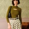The Green Mock Neck Cut Out Knit Top