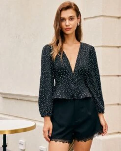 The Black V Neck Ruffle Polka Dot Blouse