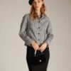 The Black Mock Neck Houndstooth Jacket