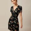 The Black V Neck Floral Button Up Mini Dress