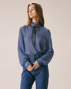 The Blue Mock Neck Dobby Mesh Blouse