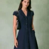 The Navy Lapel Cap Sleeve Button-up Mini Dress