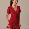 The Red V Neck Polka Dot Flounce Mini Dress