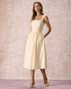 The Light Yellow Pleated Cross Back Midi Dress -Outlet Dress Mix Up Store the square neck solid midi dress light yellow dresses rh2ynt
