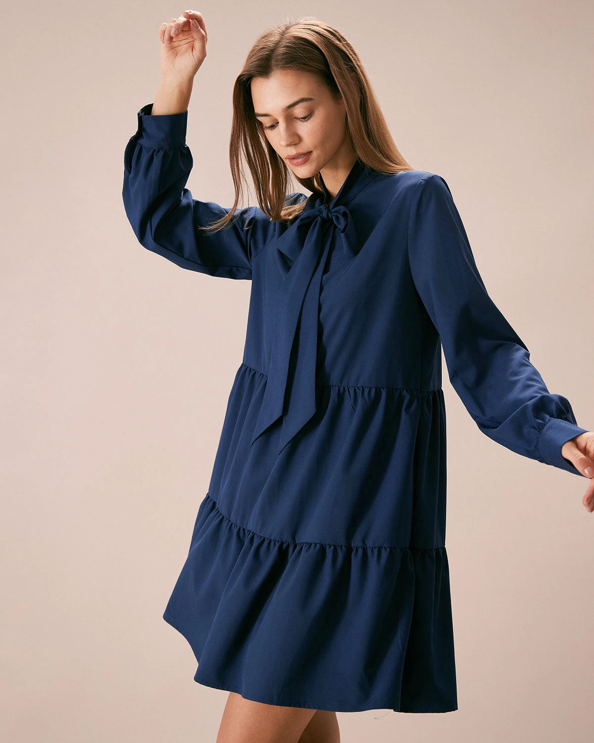 The Blue Tie-Neck Tiered Babydoll Mini Dress 1 The Blue Tie-Neck Tiered Babydoll Mini Dress