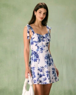 The Blue Floral Tie Strap Mini Dress -Outlet Dress Mix Up Store the tie strap floral mini dress dresses p2fnea