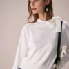 The White Mock Neck Tie Ribbed Knit Top