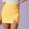 The Yellow High Waisted Ruched Mini Skirt